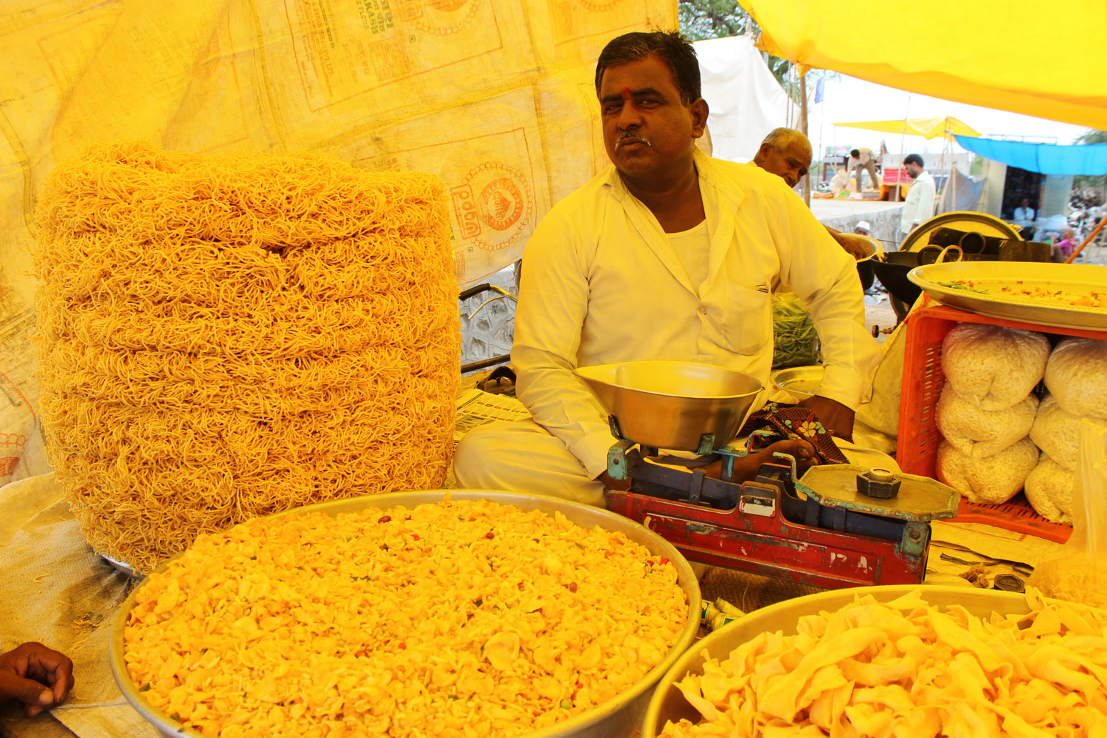 man selling food at market