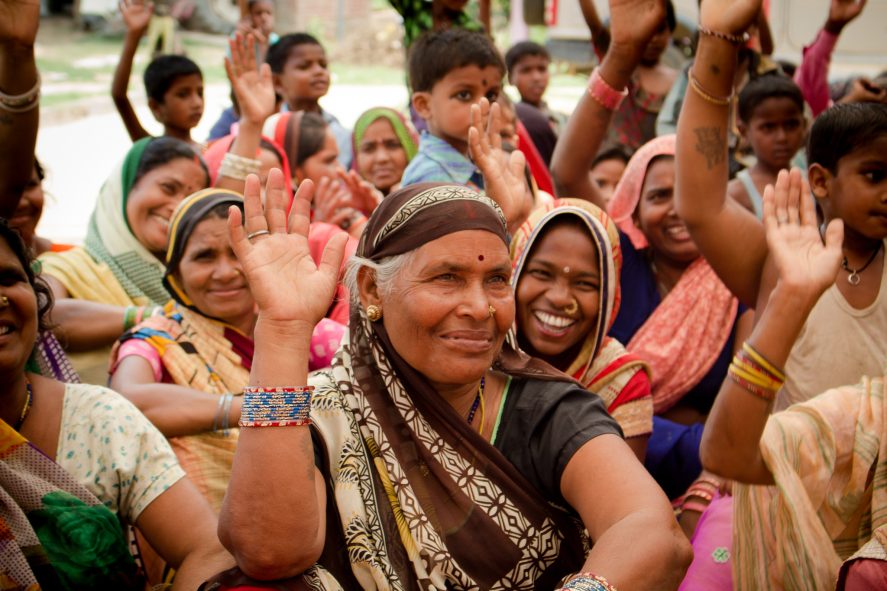 Women raising their hands