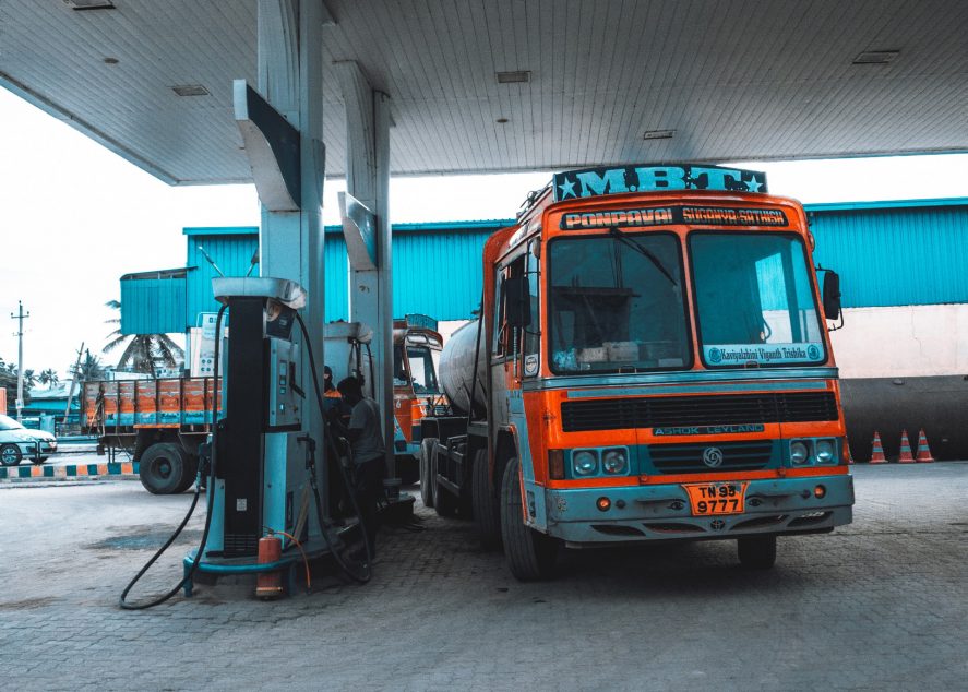 A bus at a gas station