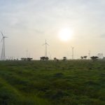 Wind turbines overlooking farmland