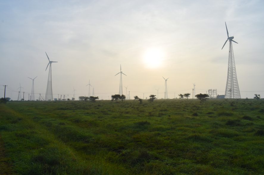 Wind turbines overlooking farmland