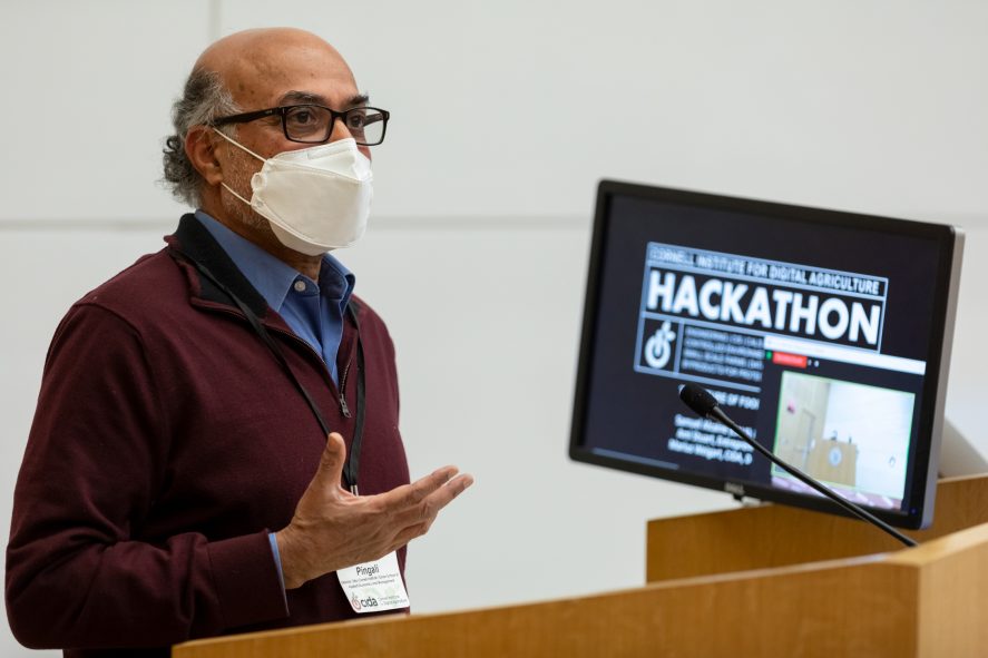 Prabhu Pingali speaking at a podium