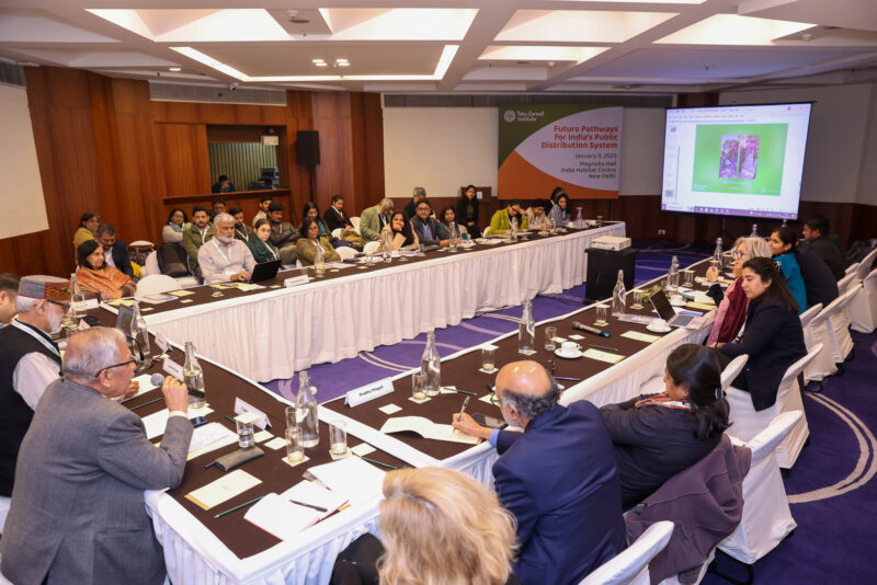 Attendees of TCI's PDS event sit at conference room tables