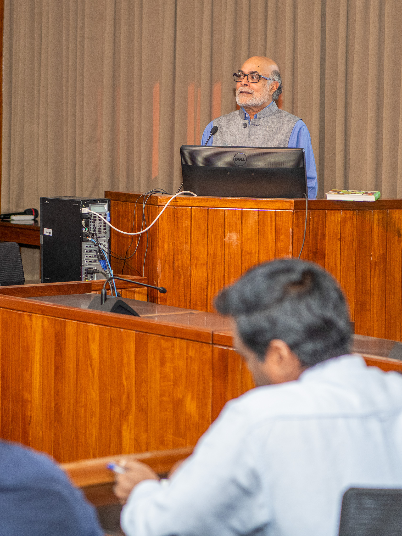 Prabhu Pingali speaking at a podium