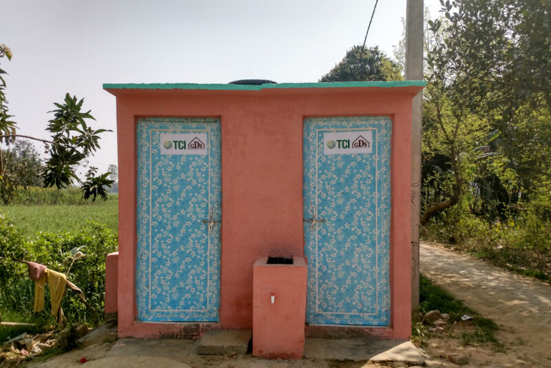 A public bathroom in India with two doors