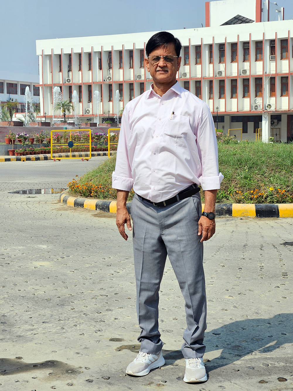 Ranjan Laik standing outside of a building