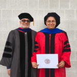 Prabhu Pingali and Shree Saha wearing academic regalia
