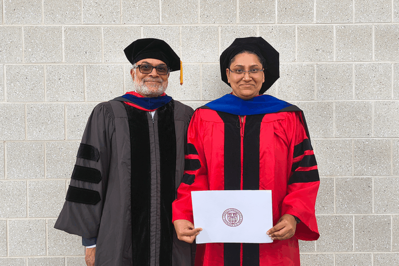 Prabhu Pingali and Shree Saha wearing academic regalia