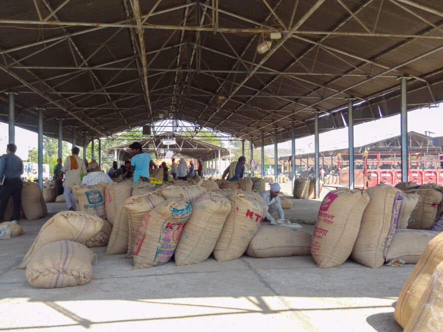 Bags of grain on display at a market