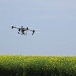 A drone flying over a field