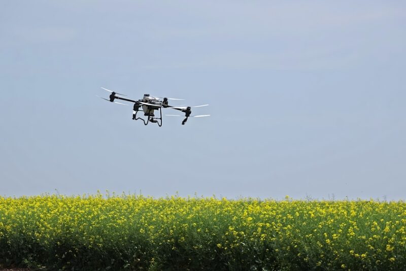 A drone flying over a field
