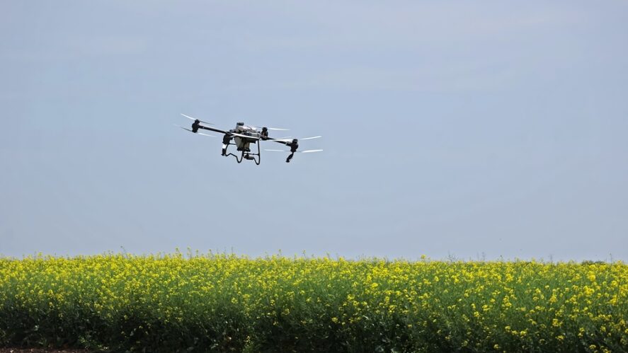 A drone flying over a field