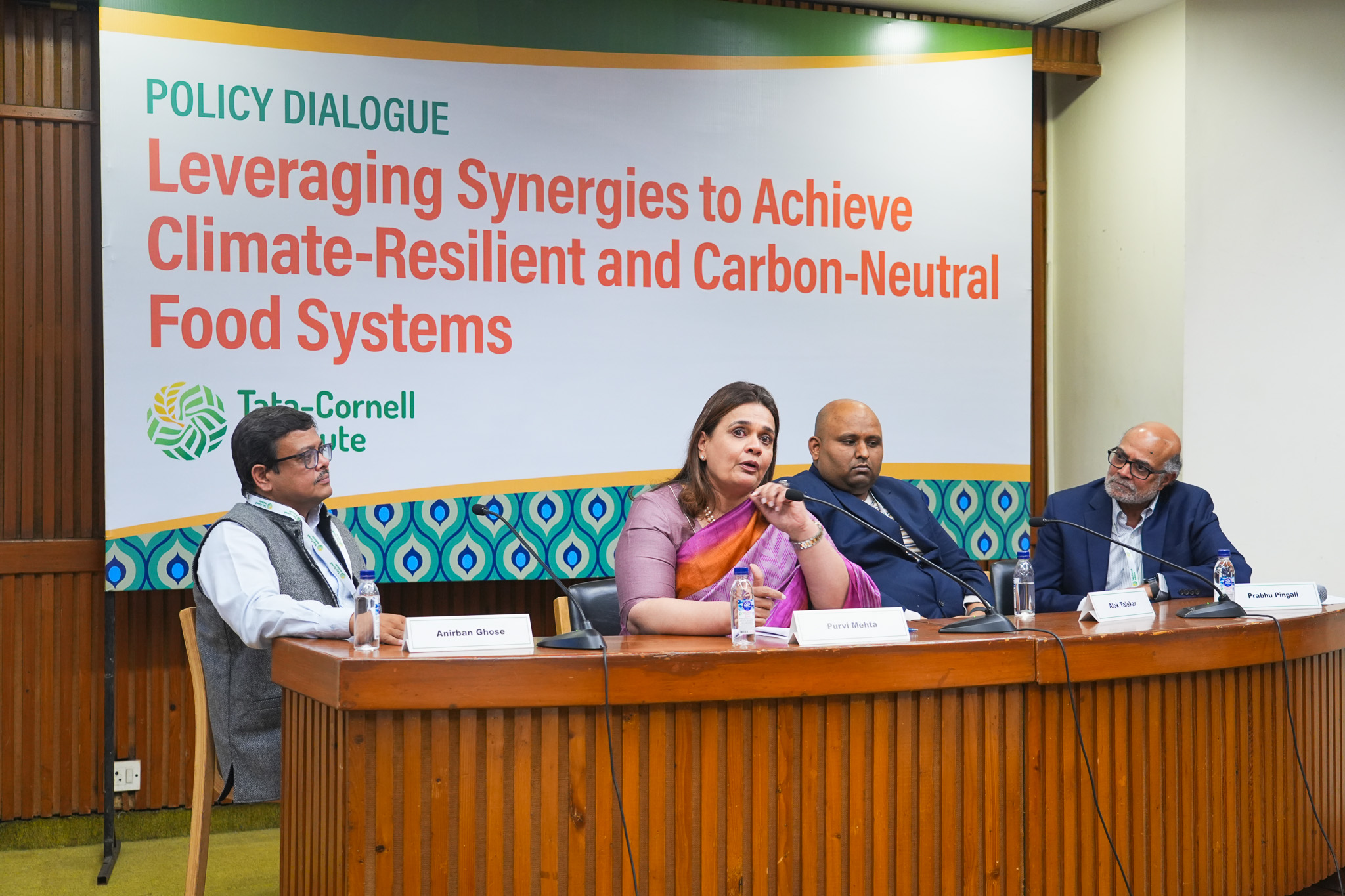 Anirban Ghose, Purvi Mehta, and Alok Talekar sit on a panel