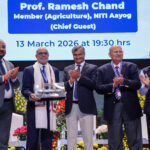 Prabhu Pingali receiving the Dr. M.S. Swaminathan Award on stage with others