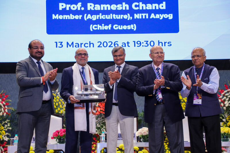 Prabhu Pingali receiving the Dr. M.S. Swaminathan Award on stage with others