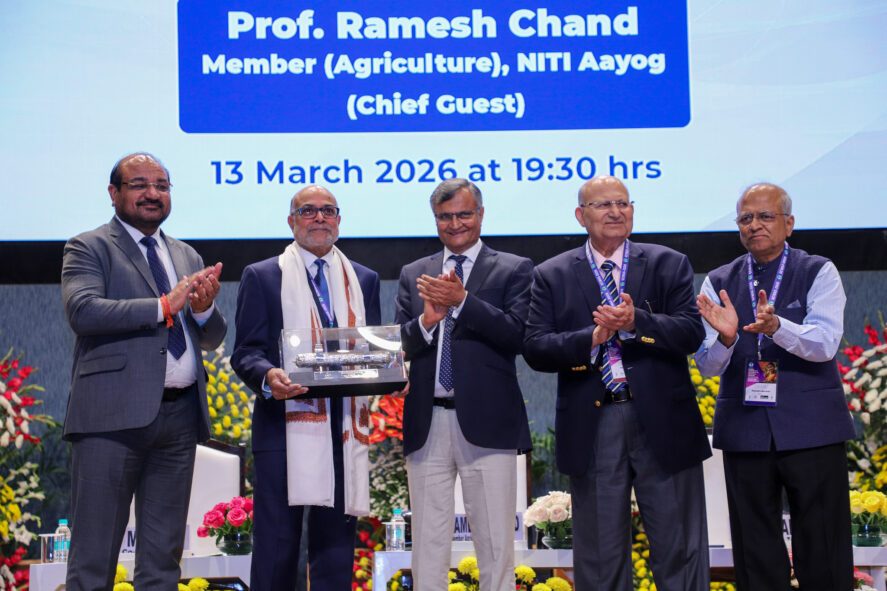 Prabhu Pingali receiving the Dr. M.S. Swaminathan Award on stage with others