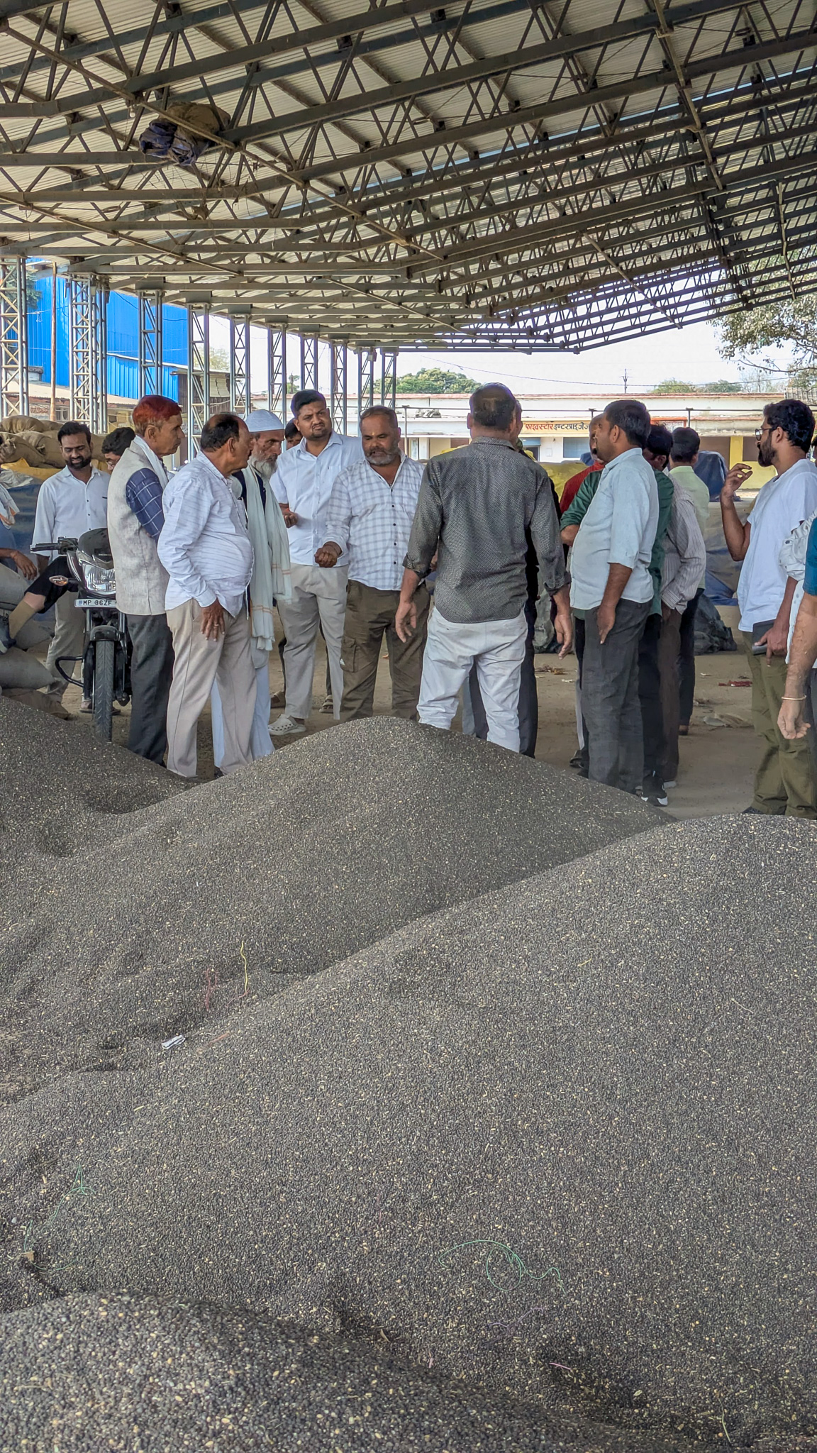 People negotiating at a black gram market