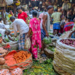 People shopping at a crowded market